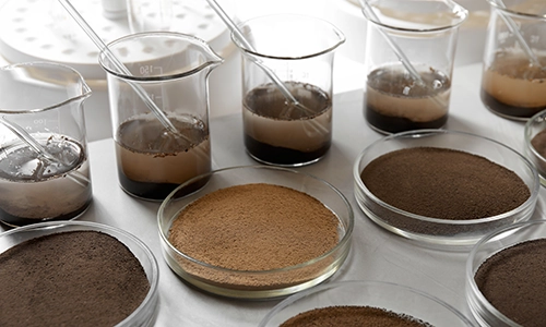 beakers and petri dishes in a laboratory containing soil and sediment for testing. Hazardous waste, Solid Waste, TCLP test, Hazardous Waste characterization, Waste Characterization, RCRA waste characterization