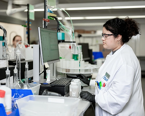 Pace Scientist working in laboratory. Pace Services for Manufacturing. Manufacturing, regulatory compliance.